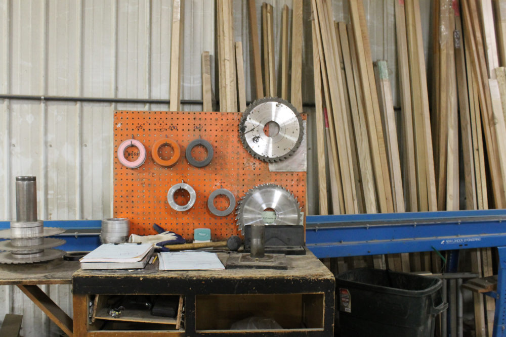 Image of saw blades near a workbench